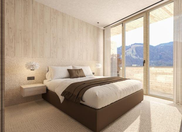 Schlafzimmer mit Doppelbett in Weiß und Braun, großen Panoramafenstern und Blick auf die Berge